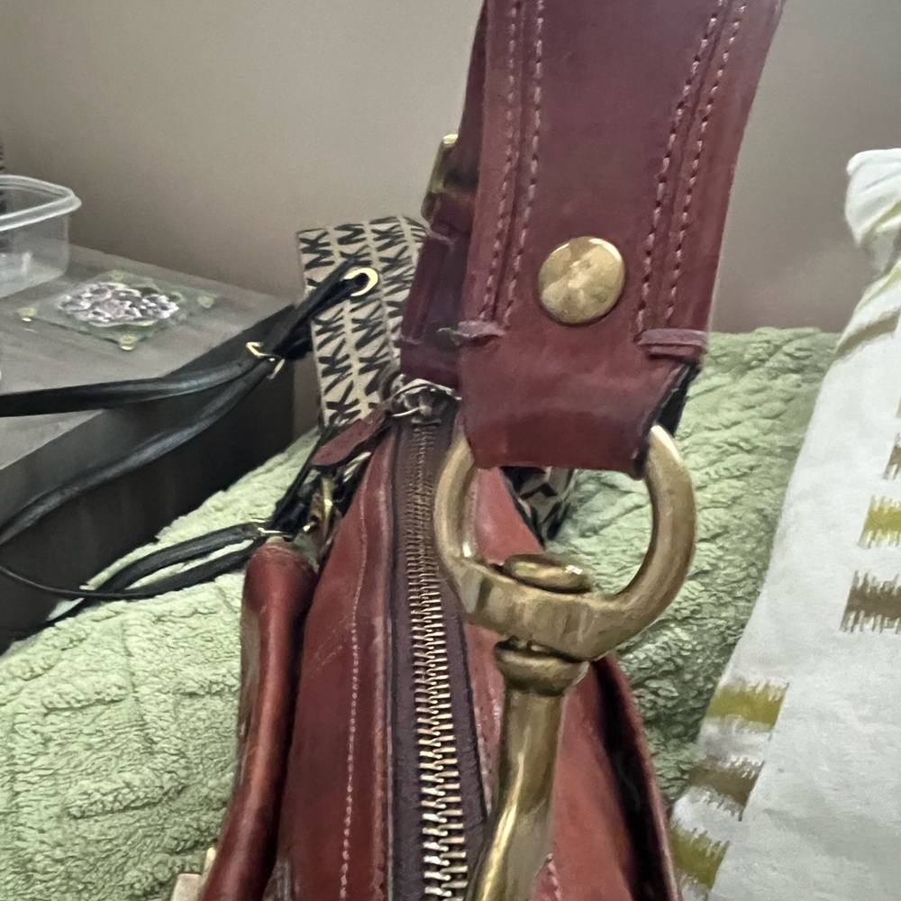 This is a coach bag that was used for one year and taken very good care of.